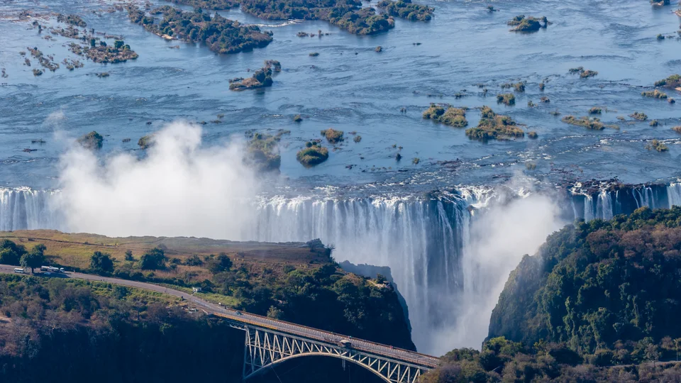 Victoria Falls and rising spray above the Zambezi gorge